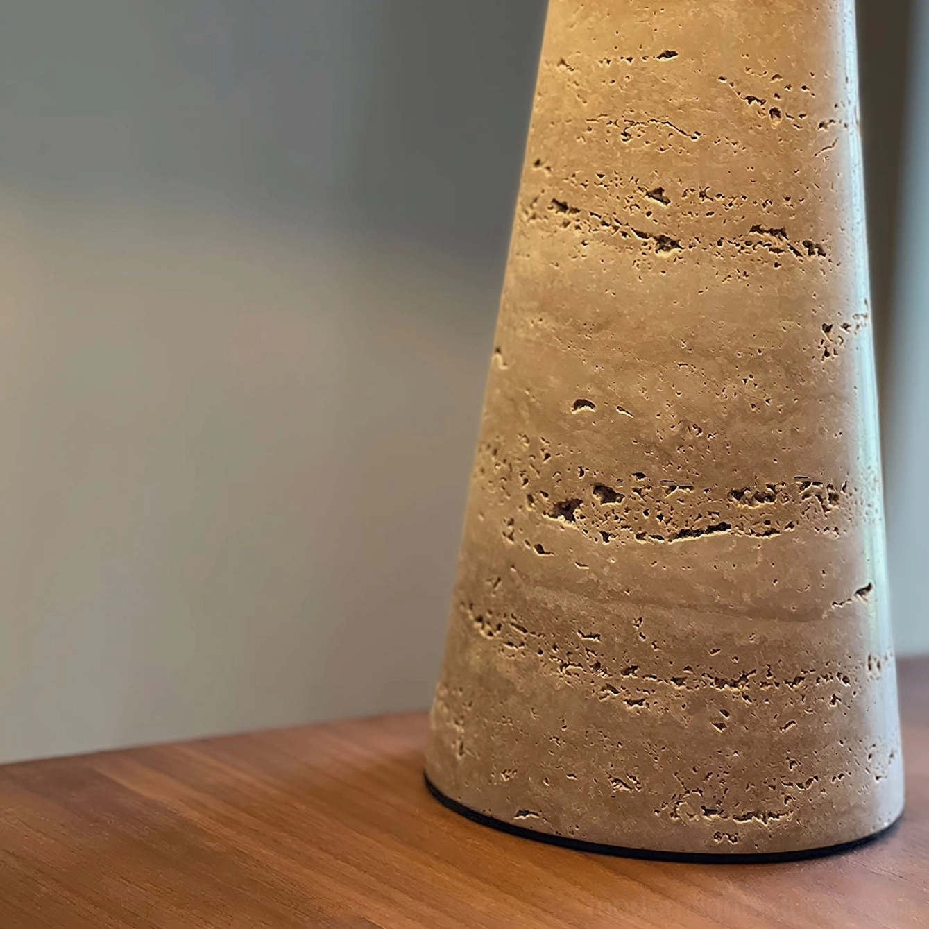 Travertine stone table lamp demonstrating design versatility across farmhouse rustic and minimalist interior styles