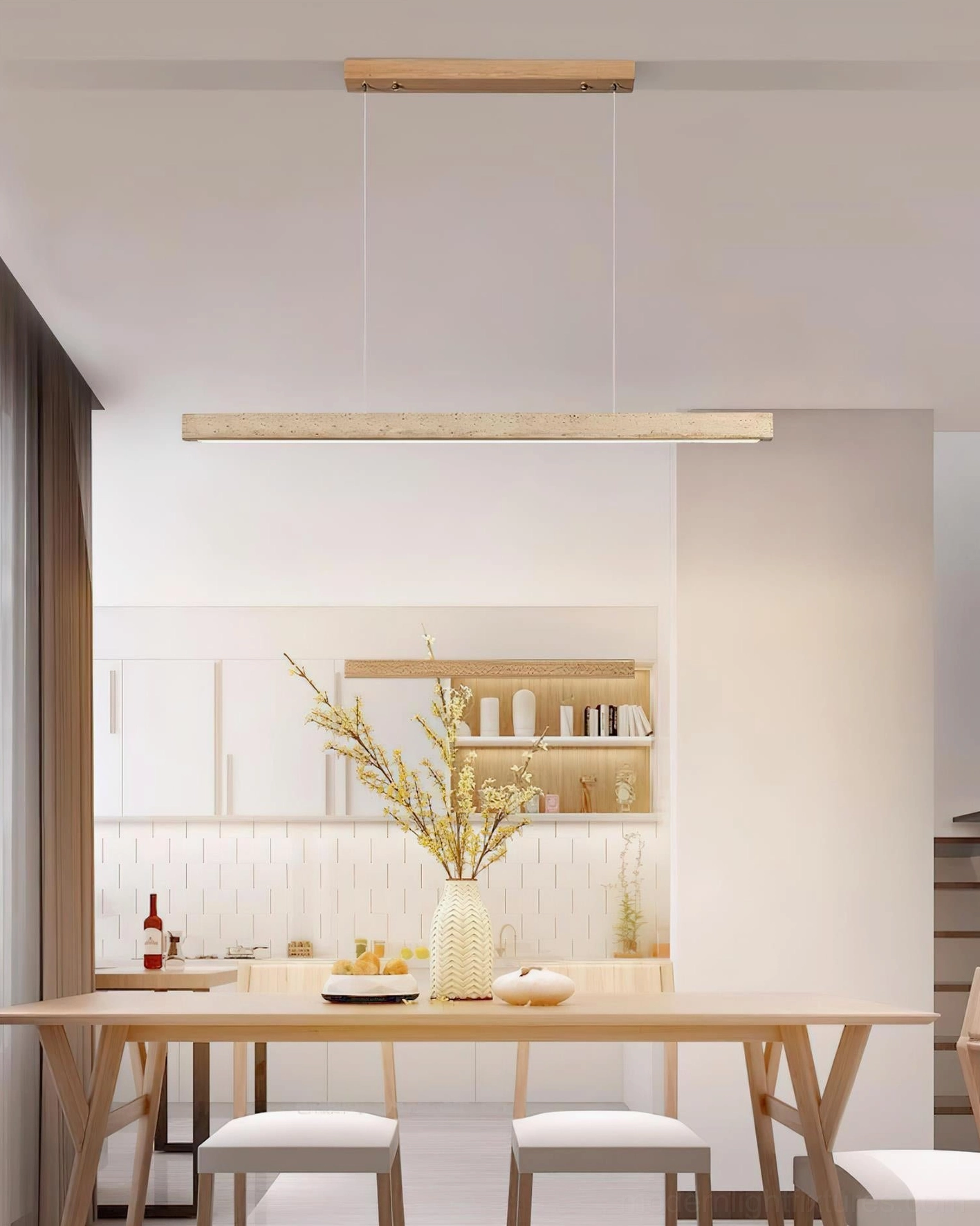 Travertine linear pendant light in open kitchen dining hybrid space wabi-sabi style