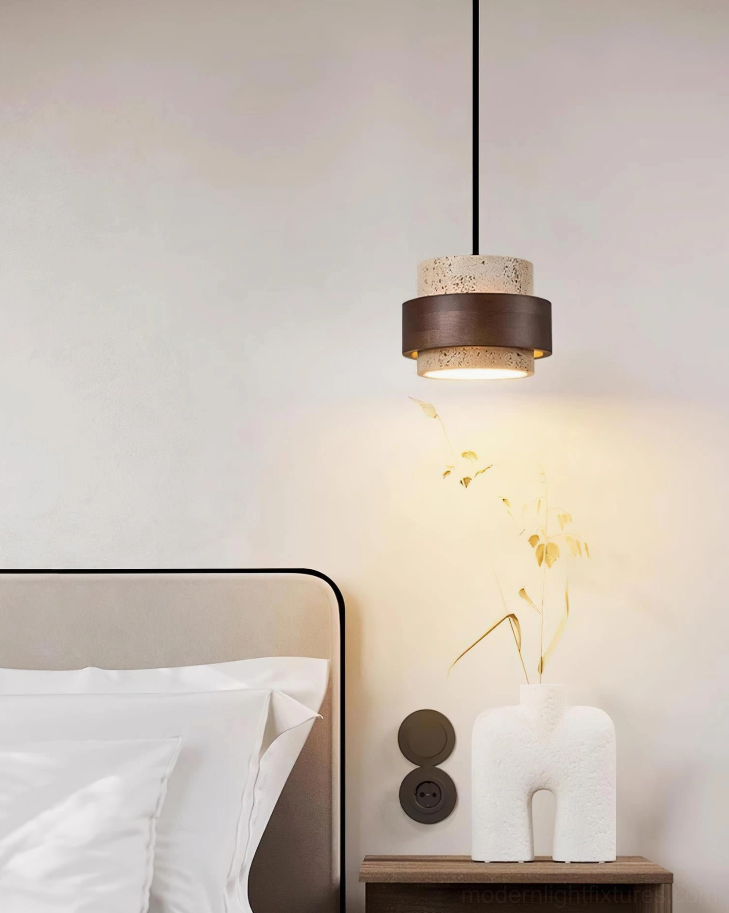 Travertine pendant light installed as bedside pendant in modern master bedroom with nightstand