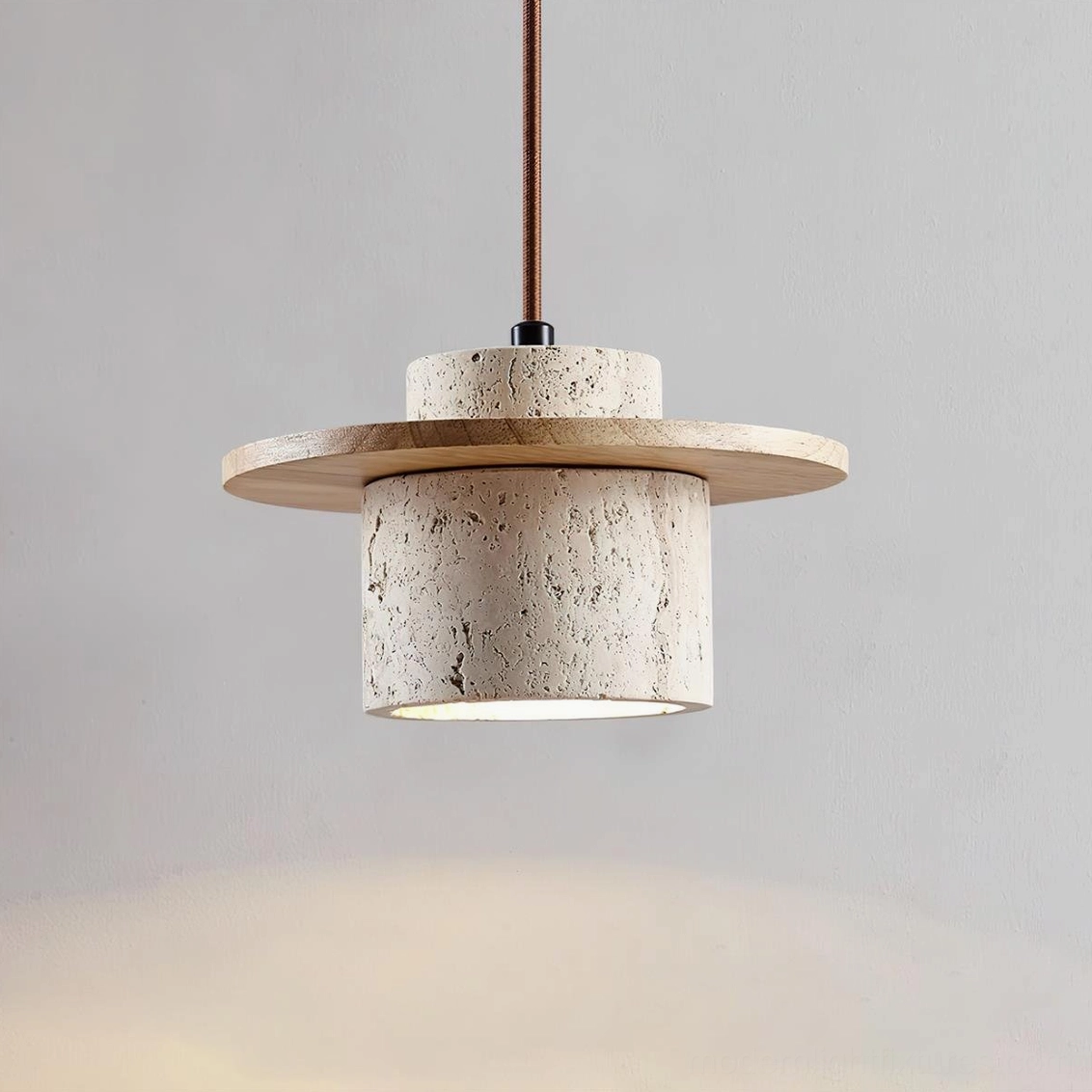 Travertine pendant light hanging fixture, angled perspective showing cylindrical stone shade and integrated wood disc design