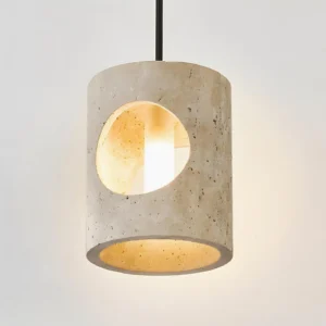 Illuminated travertine pendant lamp from overhead angle, displaying warm ambient light diffusing through circular cutout opening