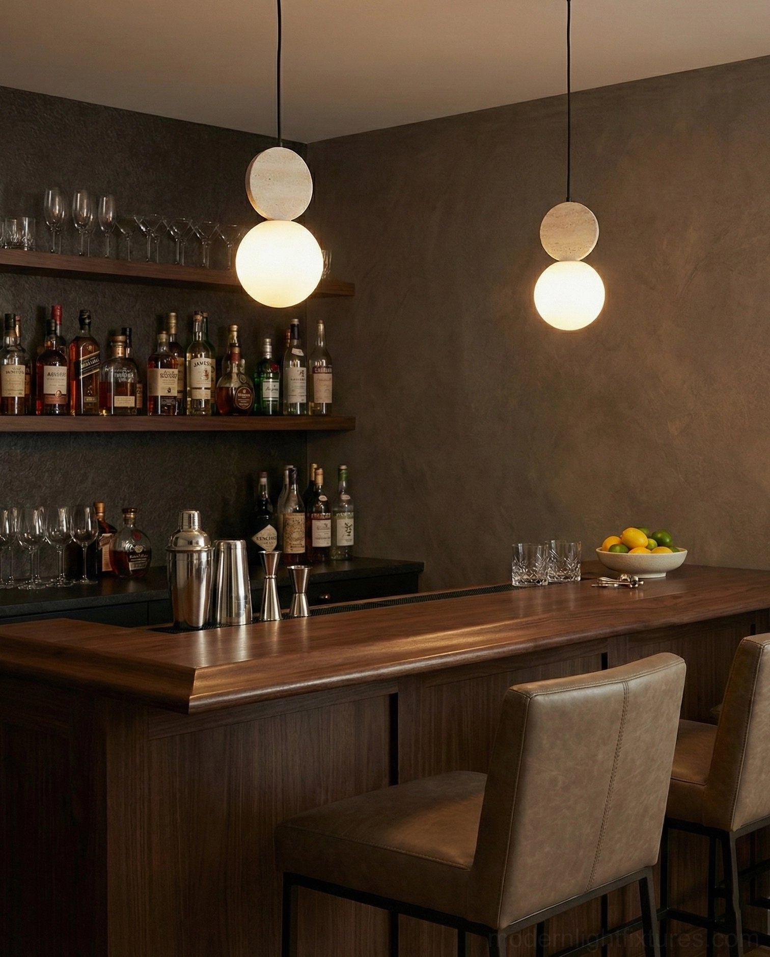 Cenari travertine and glass pendant lamp showing porous natural stone texture and soft frosted light diffusion
