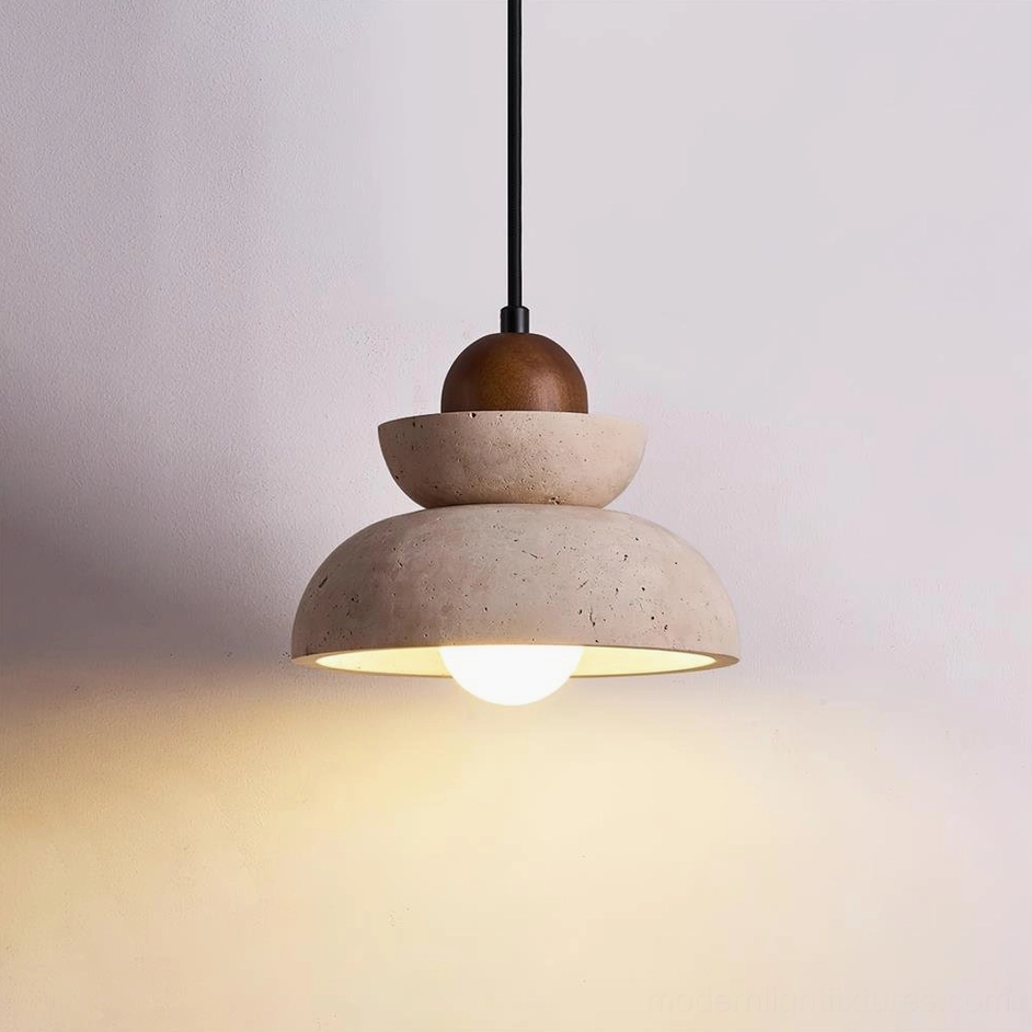 Single travertine pendant lamp with warm illumination showing exposed LED bulb and natural stone texture