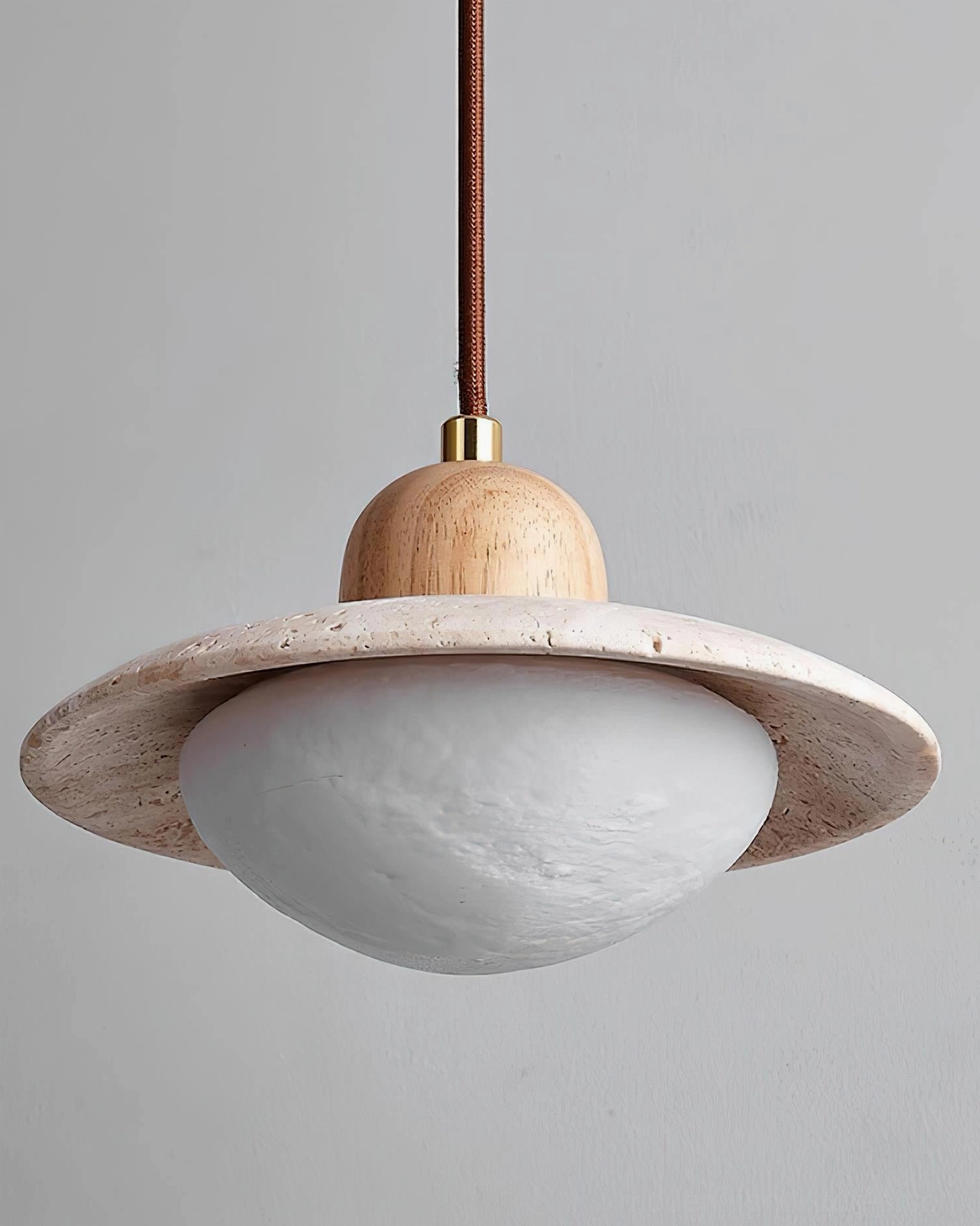 Top-down travertine stone pendant lamp frosted glass diffuser detail