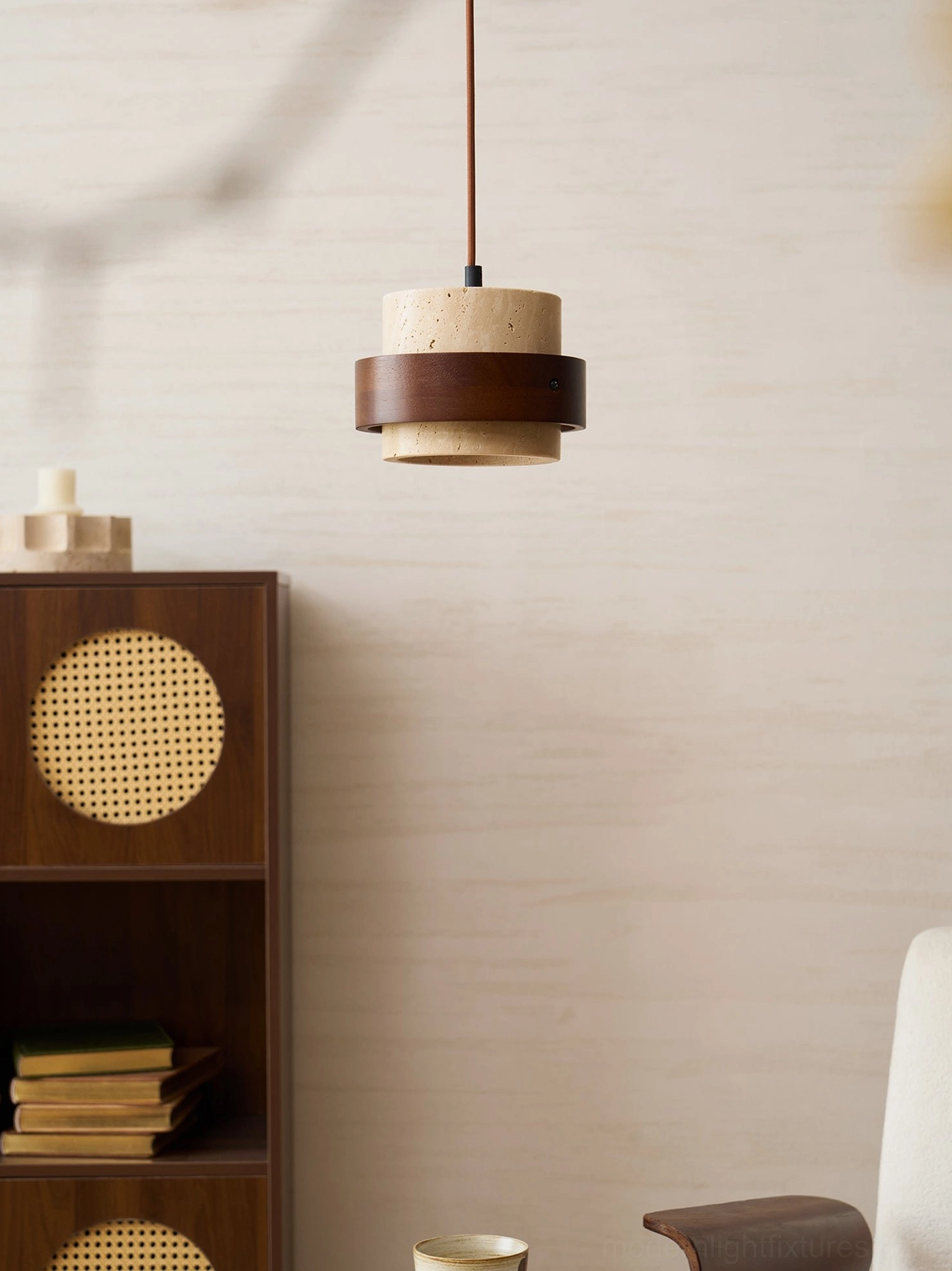Travertine pendant light fixture in transitional interior design setting, bridging contemporary and traditional aesthetics