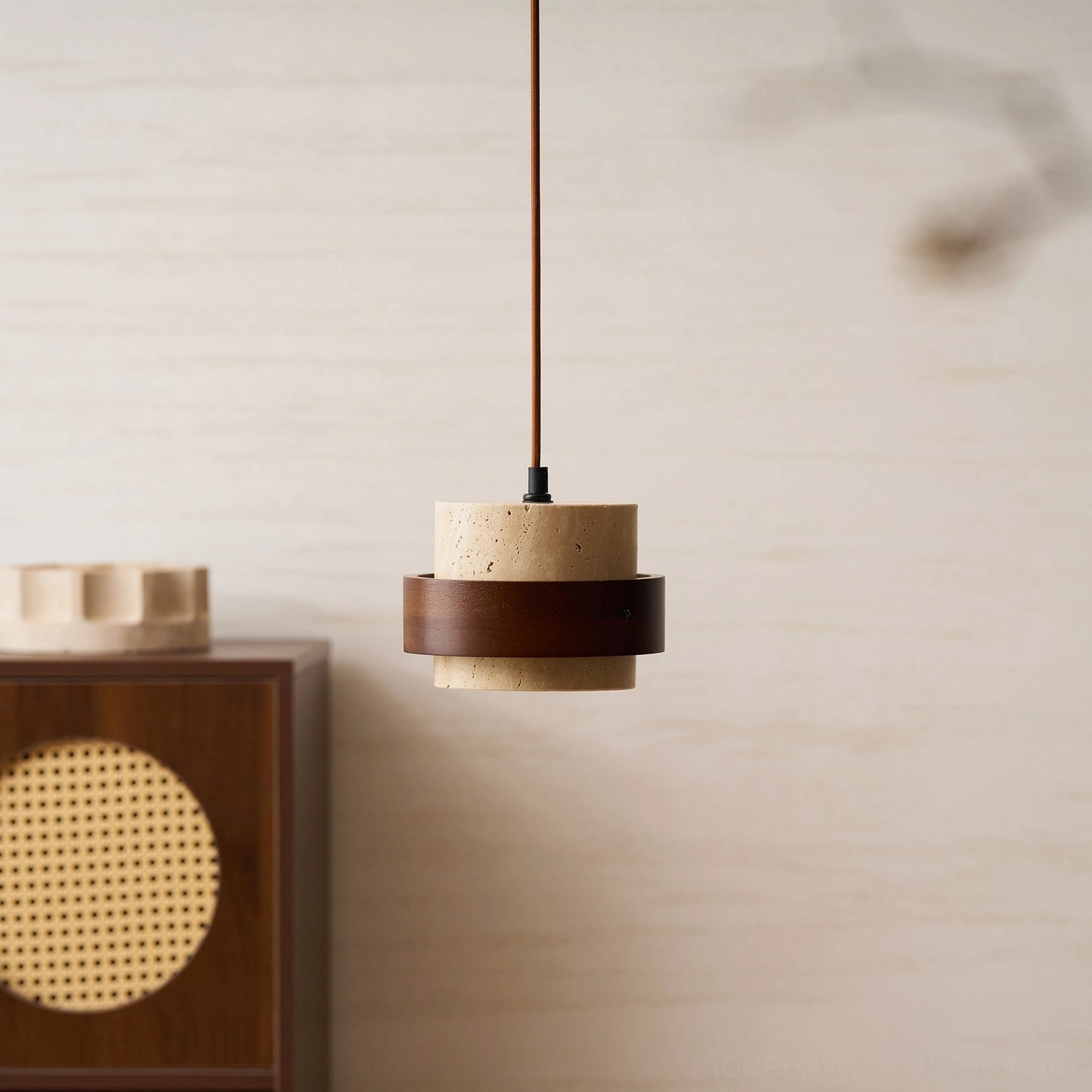 Walnut wood band detail of travertine pendant lamp, showing warm wood grain trim at stone shade midpoint
