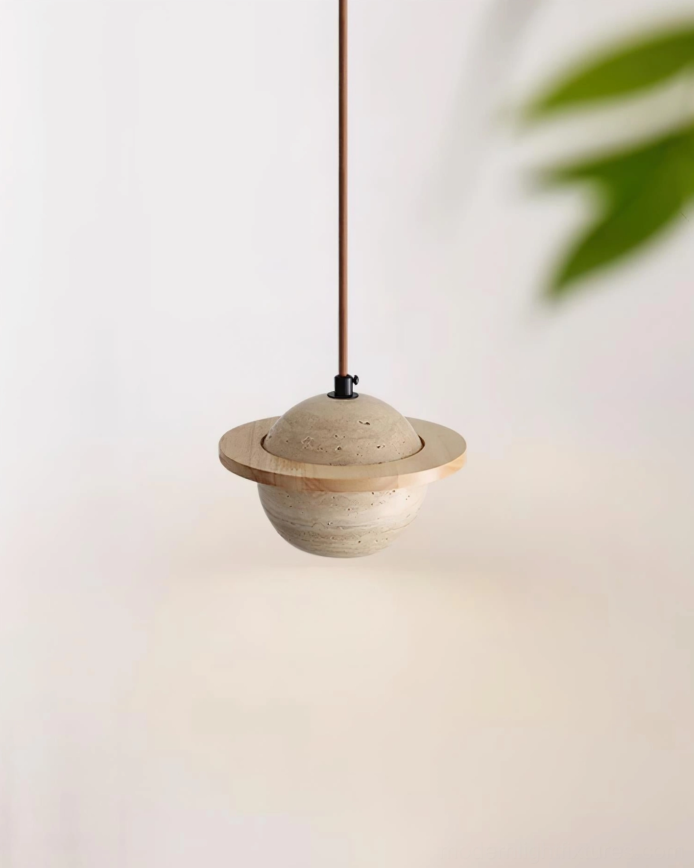 Architectural detail of travertine pendant light, natural sedimentary stone sphere with geometric metal ring accent