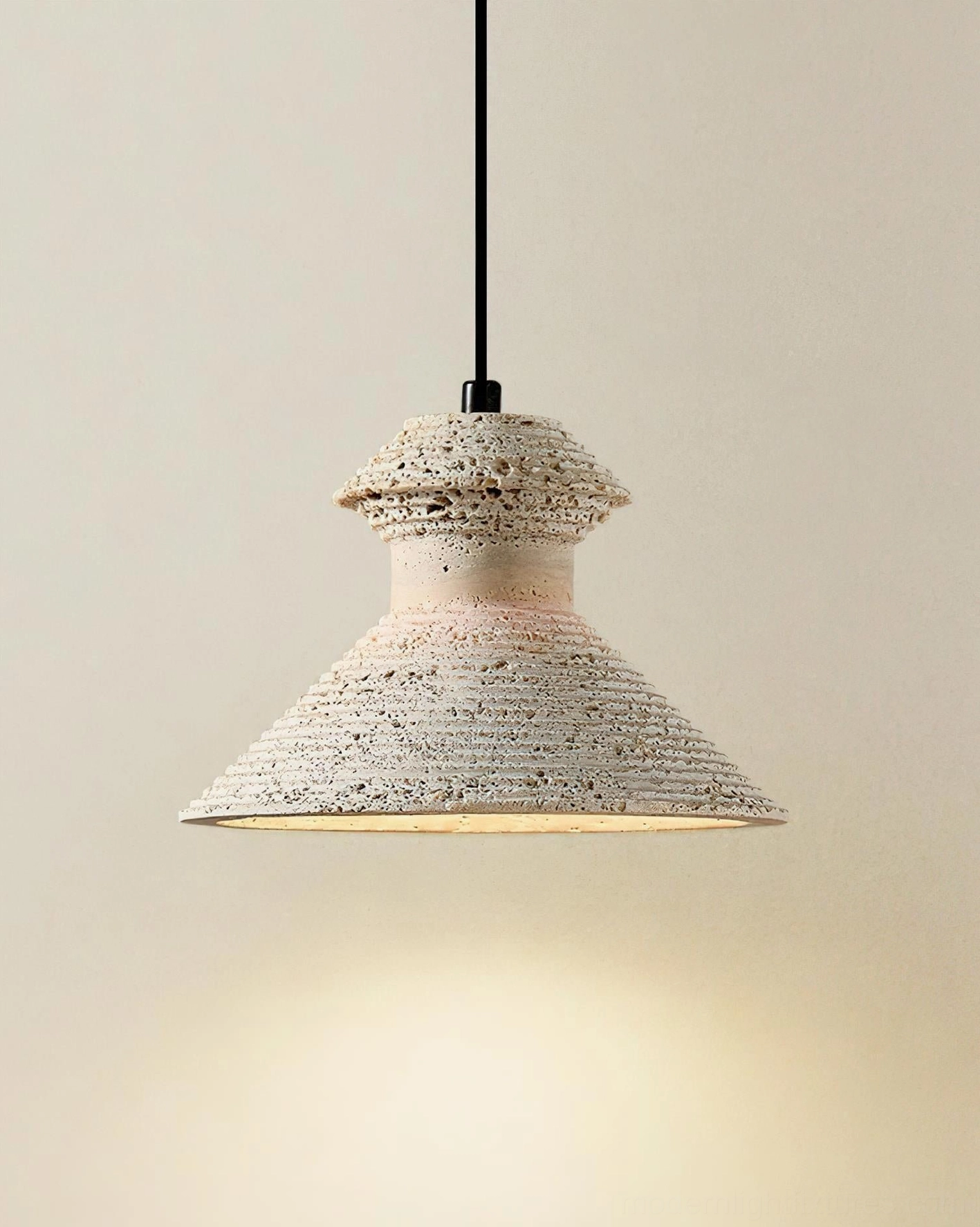 Travertine pendant light installed in spa-inspired bathroom creating relaxation-focused ambient lighting