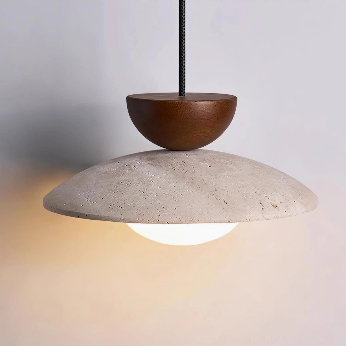 Tia travertine pendant lamp suspended in contemporary bedroom accent lighting application