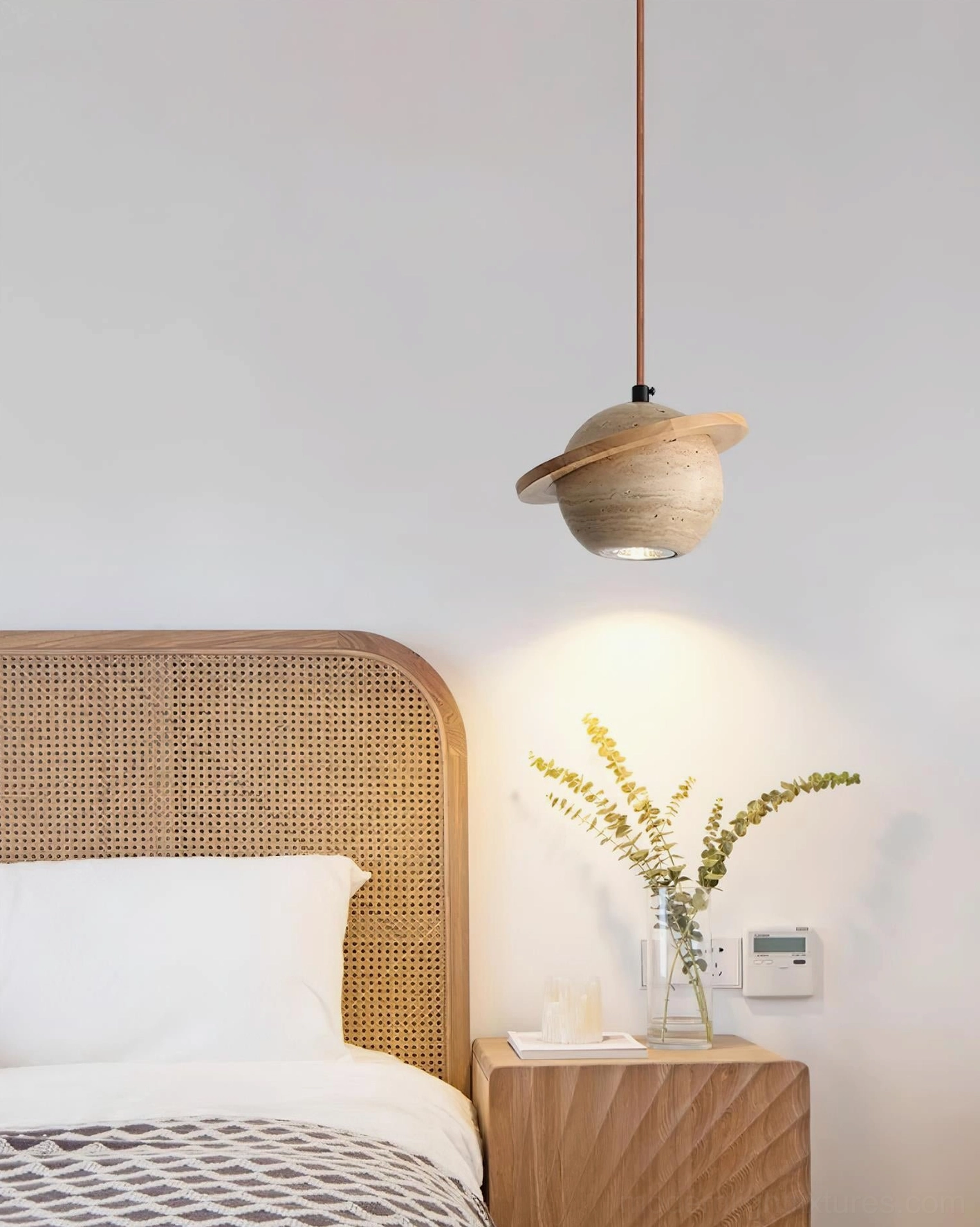 Travertine sphere pendant light with beige natural stone finish, minimalist neutral color palette for versatile interiors