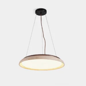 Piedra travertine pendant light in beige stone with black ceiling mount - frontal studio view showing natural stone texture and warm LED glow