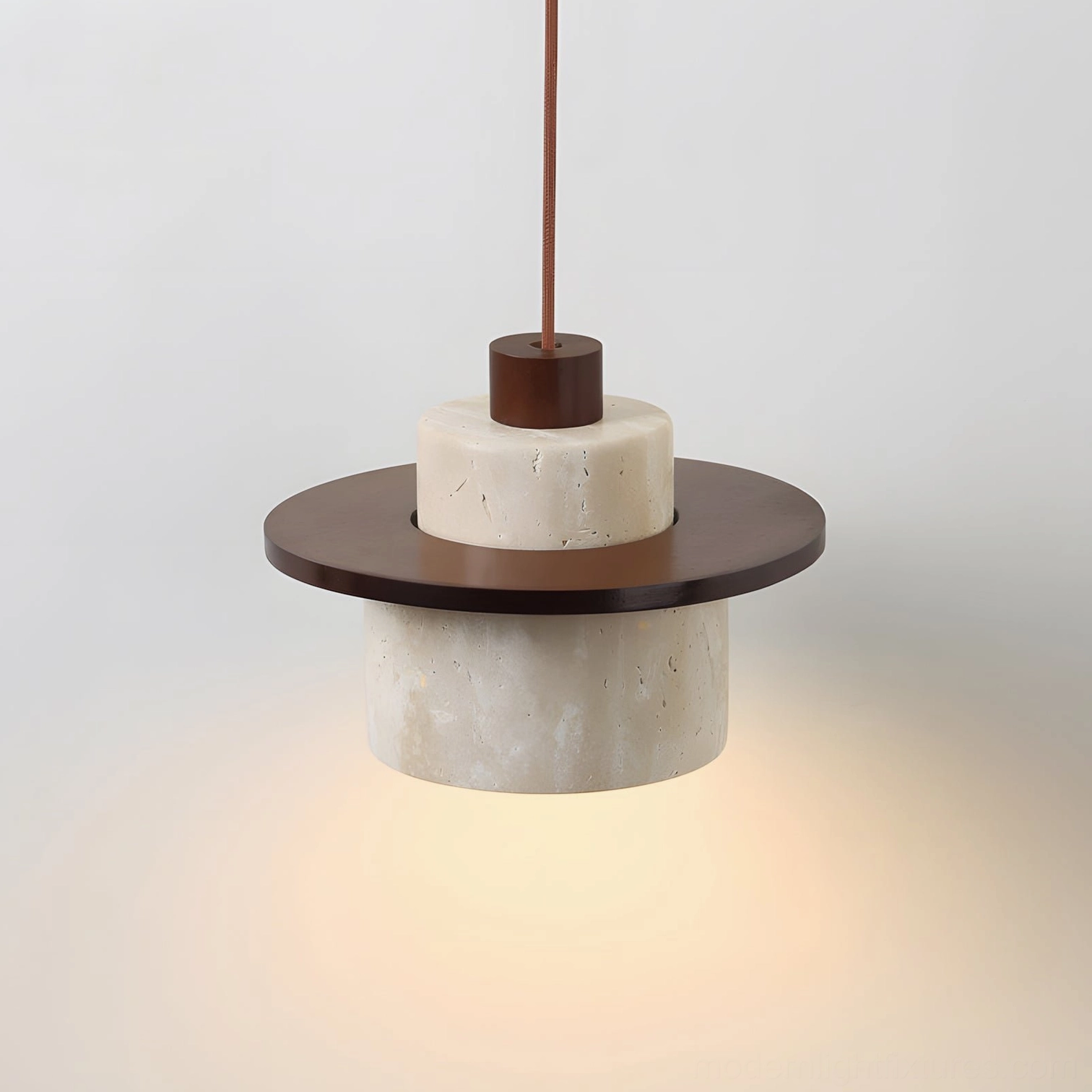Bottom view of travertine pendant lamp showing warm diffused light through natural stone