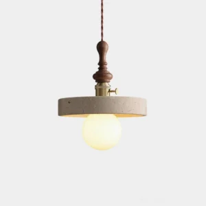 Travertine pendant light with brass fitting and walnut stem - front studio view