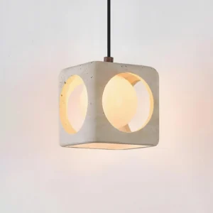 Close-up of Hollowa travertine pendant lamp showing warm ambient light and detailed hollow arch cuts