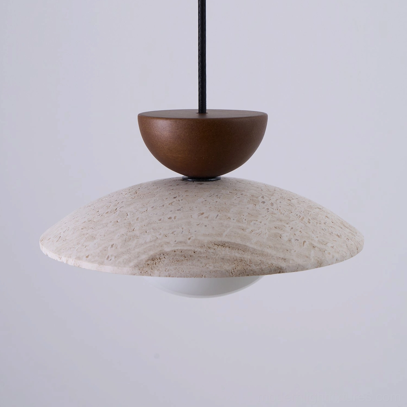 Tia natural travertine pendant light installed in contemporary kitchen design