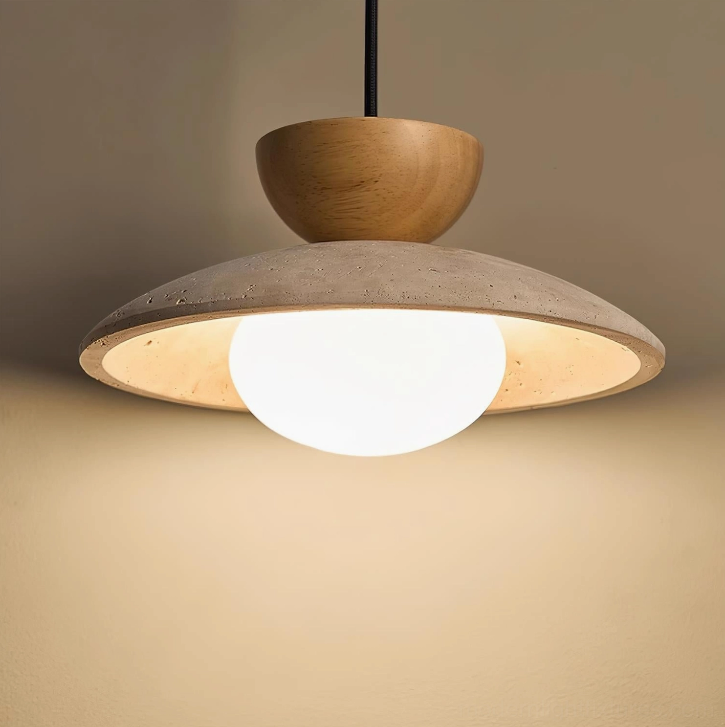 Tia travertine pendant light installation showing cord length and height adjustability