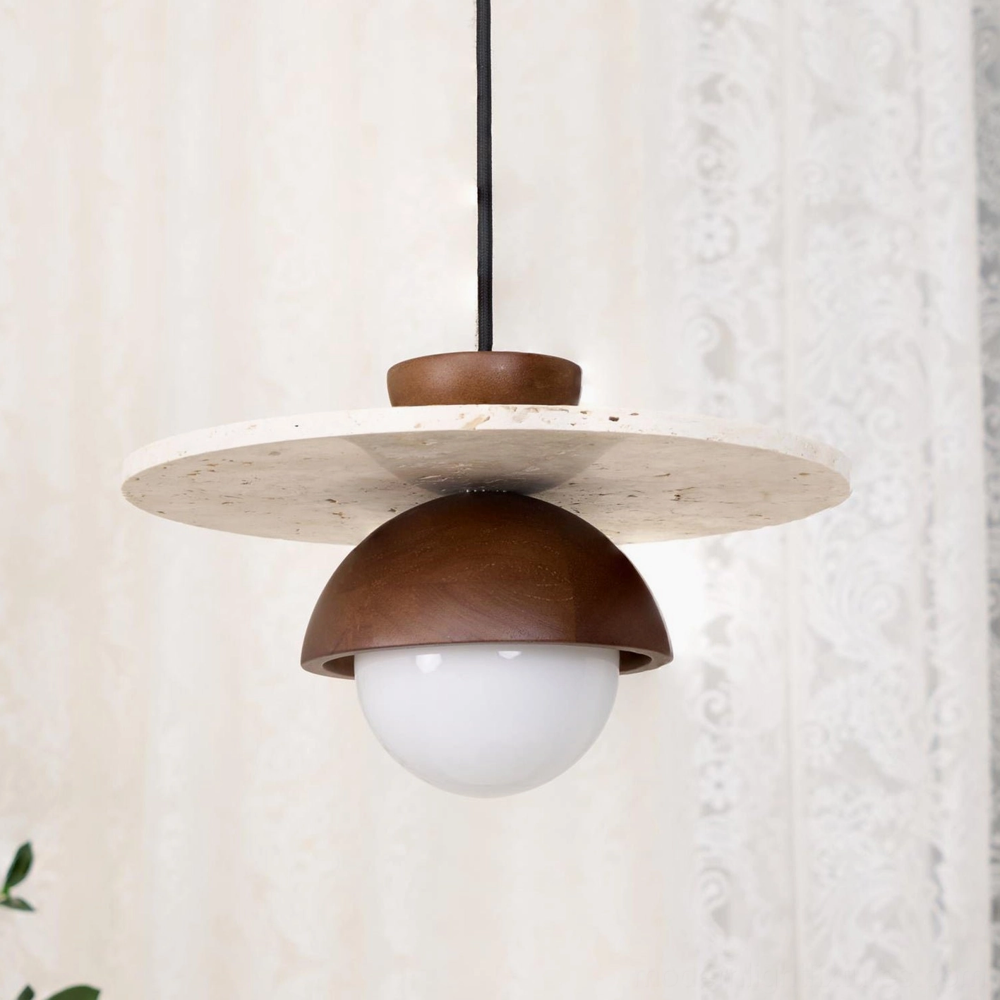 Travertine and glass modern pendant light suitable for dining rooms, bedrooms, and contemporary interiors