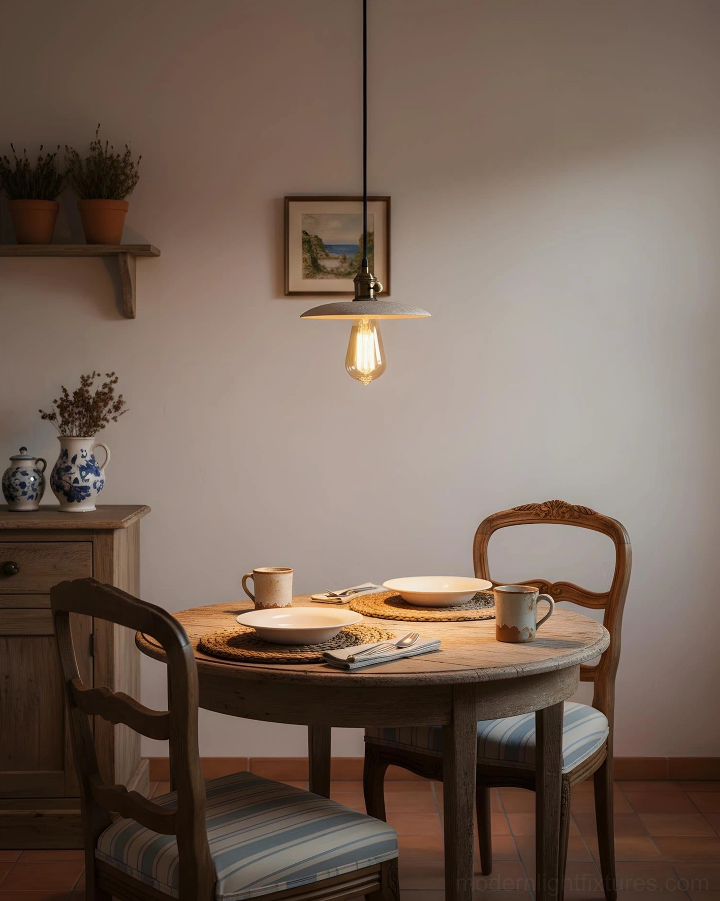 Single travertine pendant light in farmhouse dining room with wooden table and warm Edison bulb