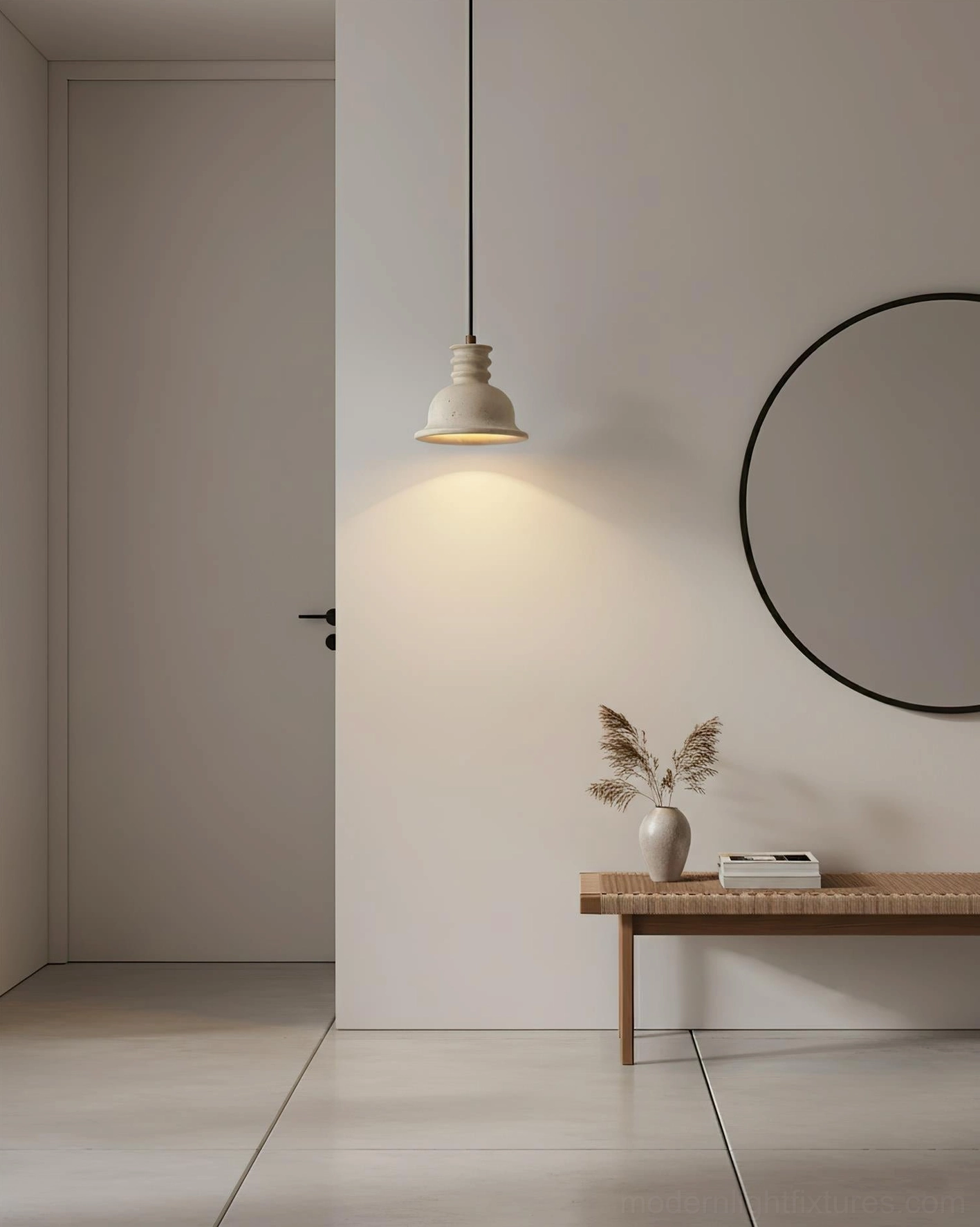 Beige travertine pendant light suspended in minimalist entryway with neutral tones and soft sculptural stone shade