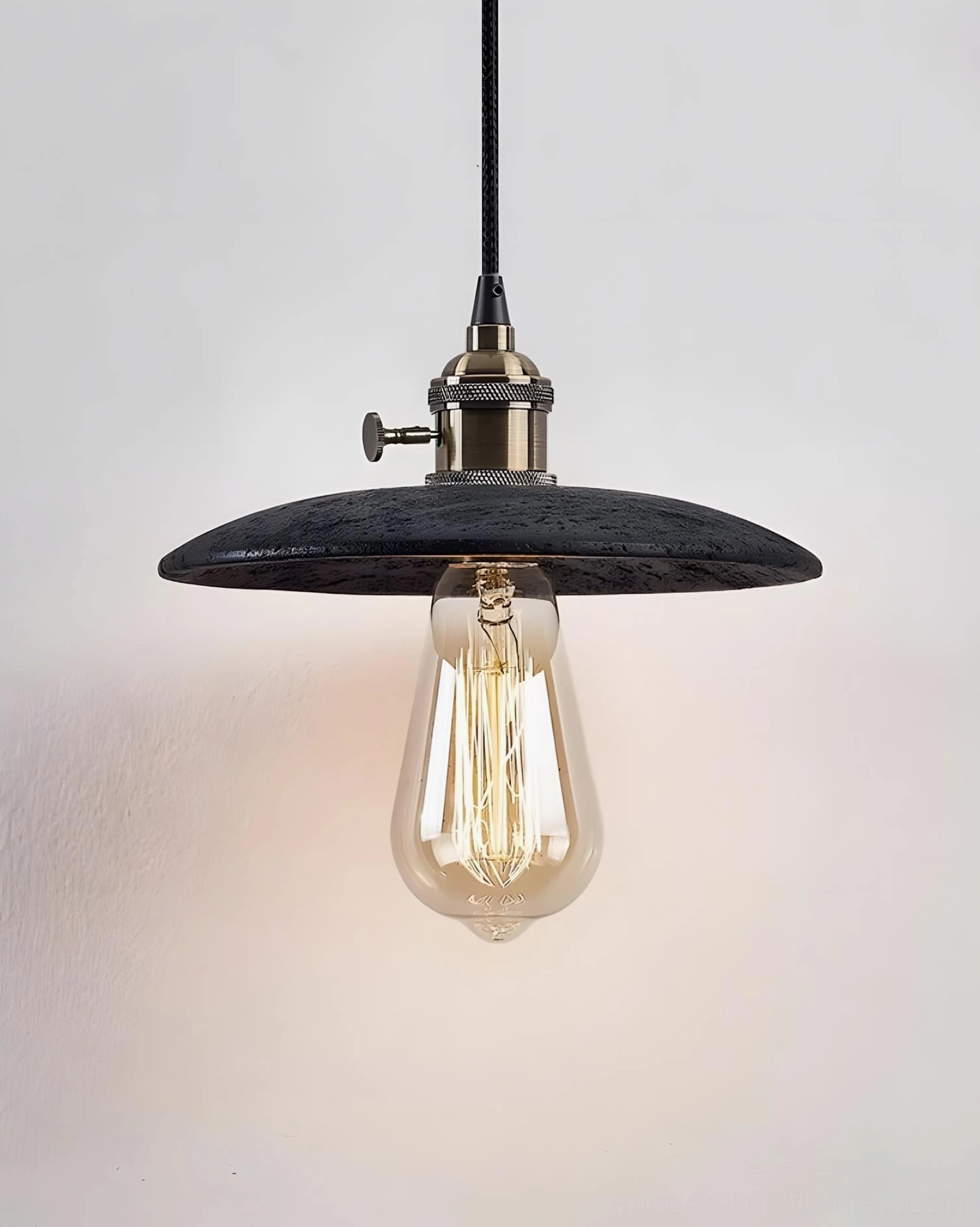 Travertine pendant light fixture highlighting natural stone variations and warm illumination