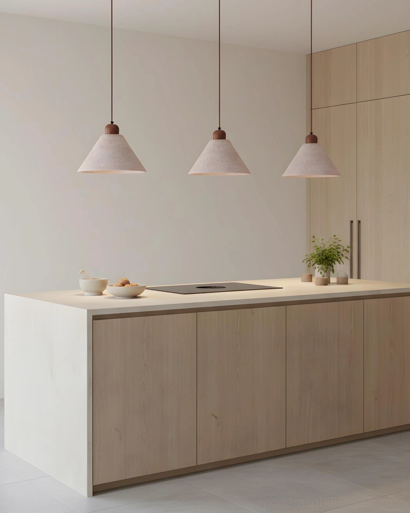 Three-unit travertine pendant lamp set in minimalist white and wood kitchen, showing consistent cone shade design and spacing