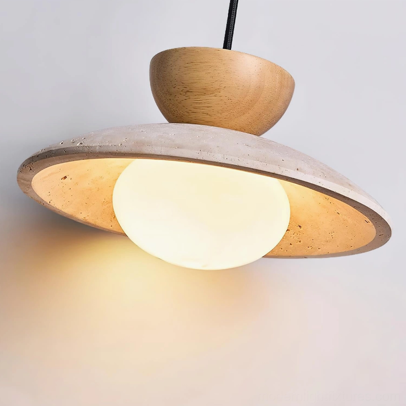 Tia natural travertine pendant light showing material richness and surface veining details