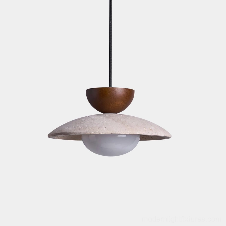 Tia natural travertine pendant light with frosted glass sphere and black cord, front view against white background