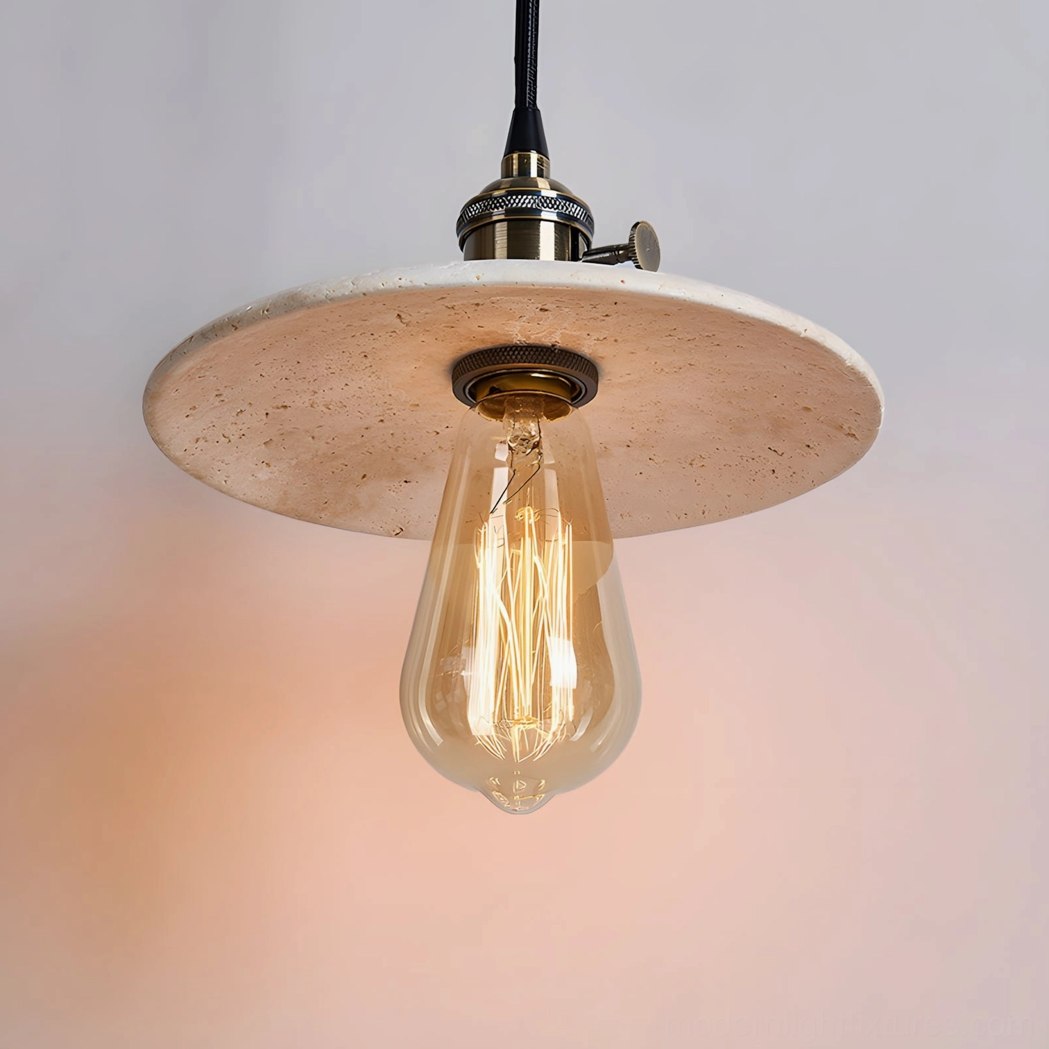 Travertine pendant light showing natural stone texture and porous surface characteristics