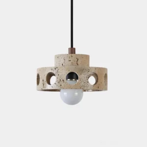 Travertine pendant light with perforated shade and exposed globe bulb, front view on white background