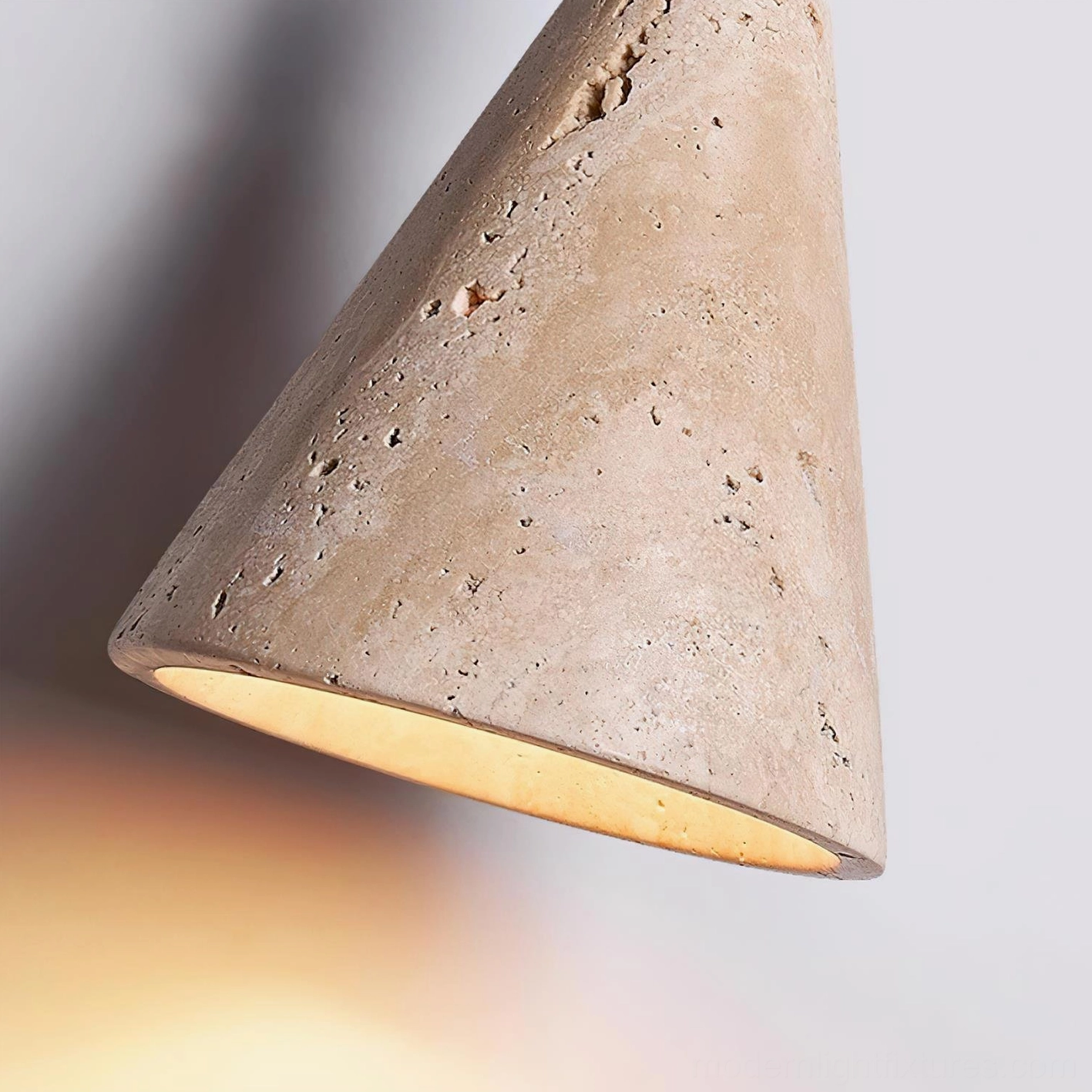Travertine cone pendant light collection showing various configurations and sizes available