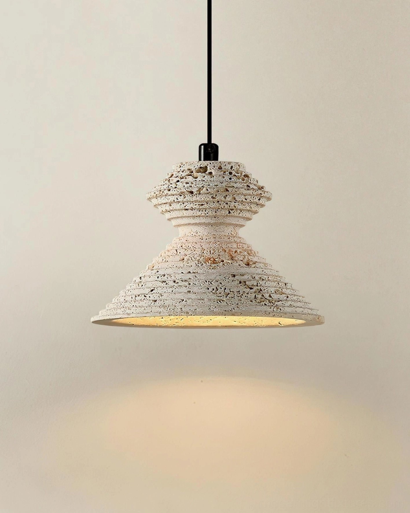 Travertine pendant light paired with natural wood and minimalist furniture in Scandinavian home style