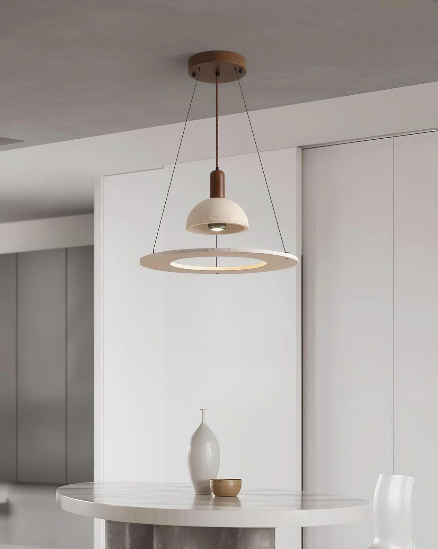 Travertine pendant light detail view showing natural stone texture and metal ring base