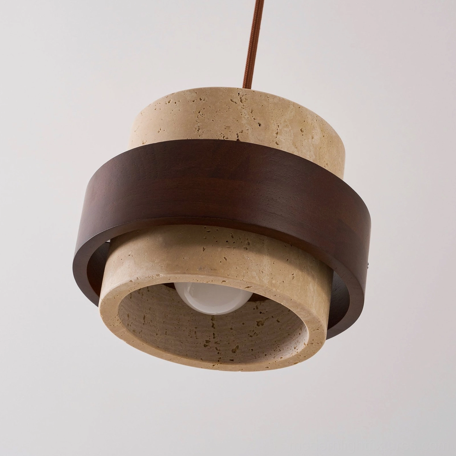 Travertine pendant light fixture suspended installation view, modern interior architectural placement