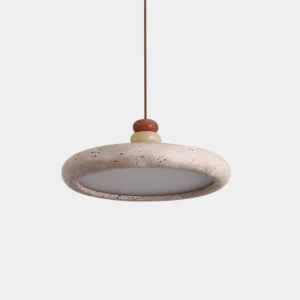 Travertine pendant light with textured beige stone shade and warm wood accent detail, close-up studio view