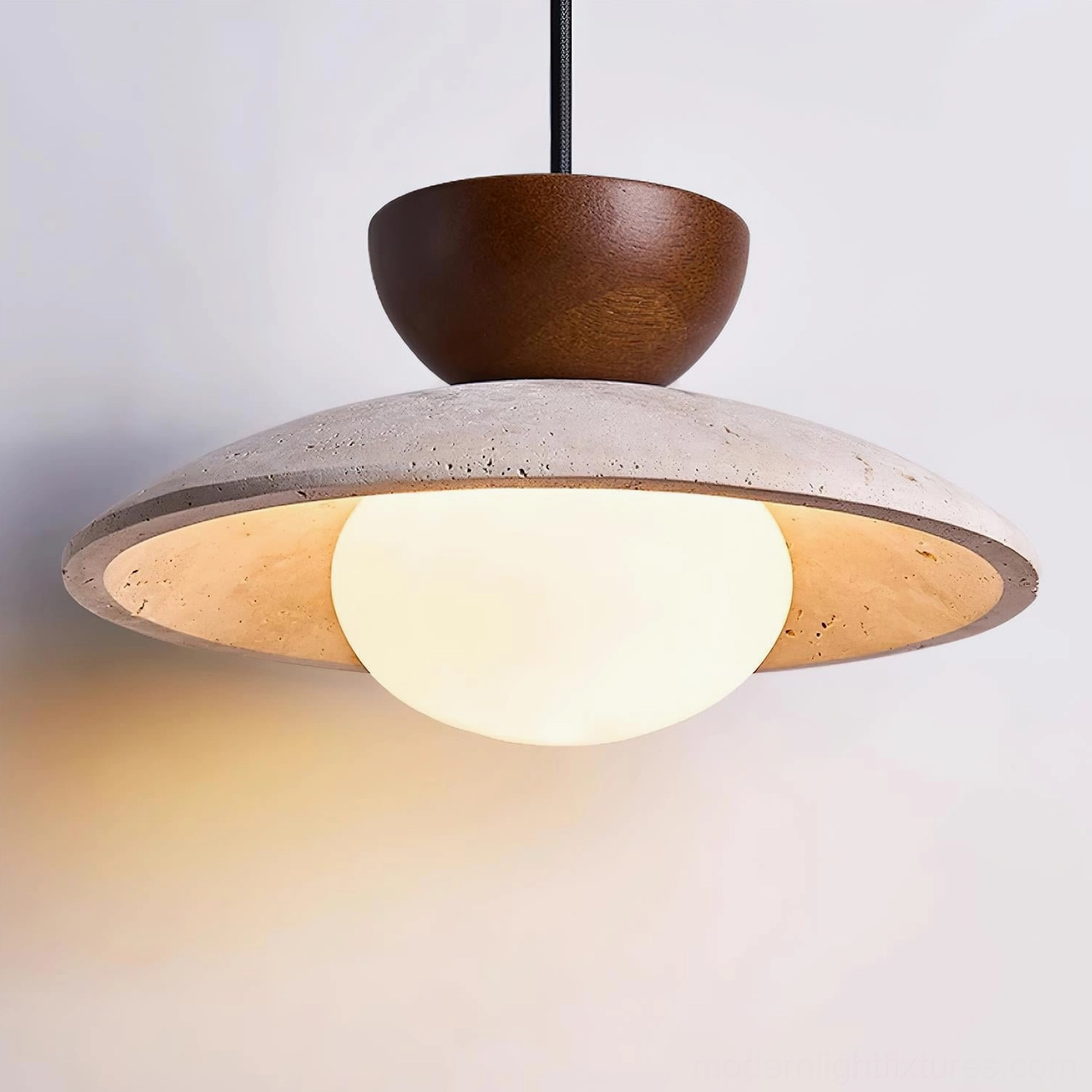 Three Tia travertine pendant lights arranged in coordinated dining ceiling installation