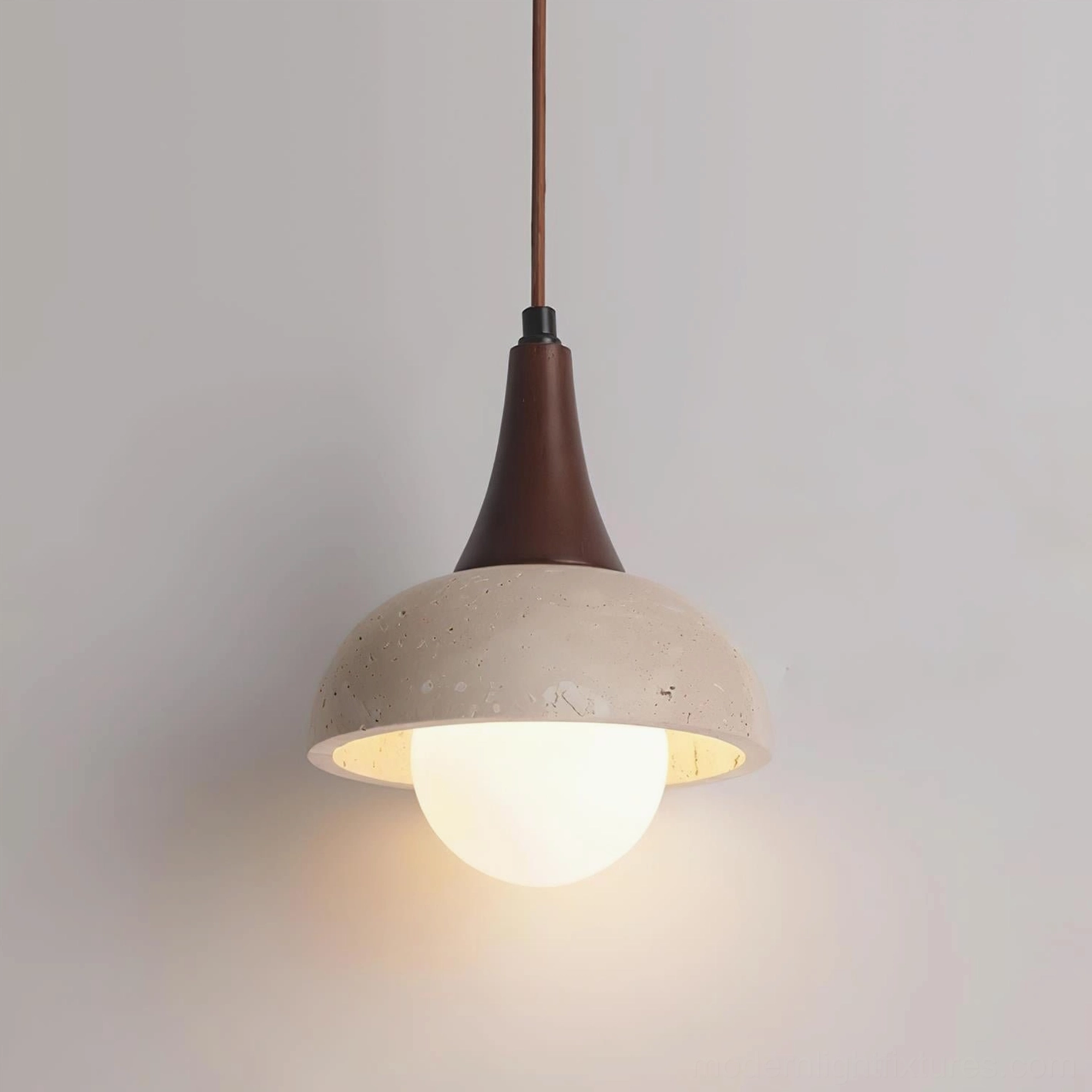 Contemporary travertine pendant light wabi-sabi aesthetic natural stone imperfections design philosophy