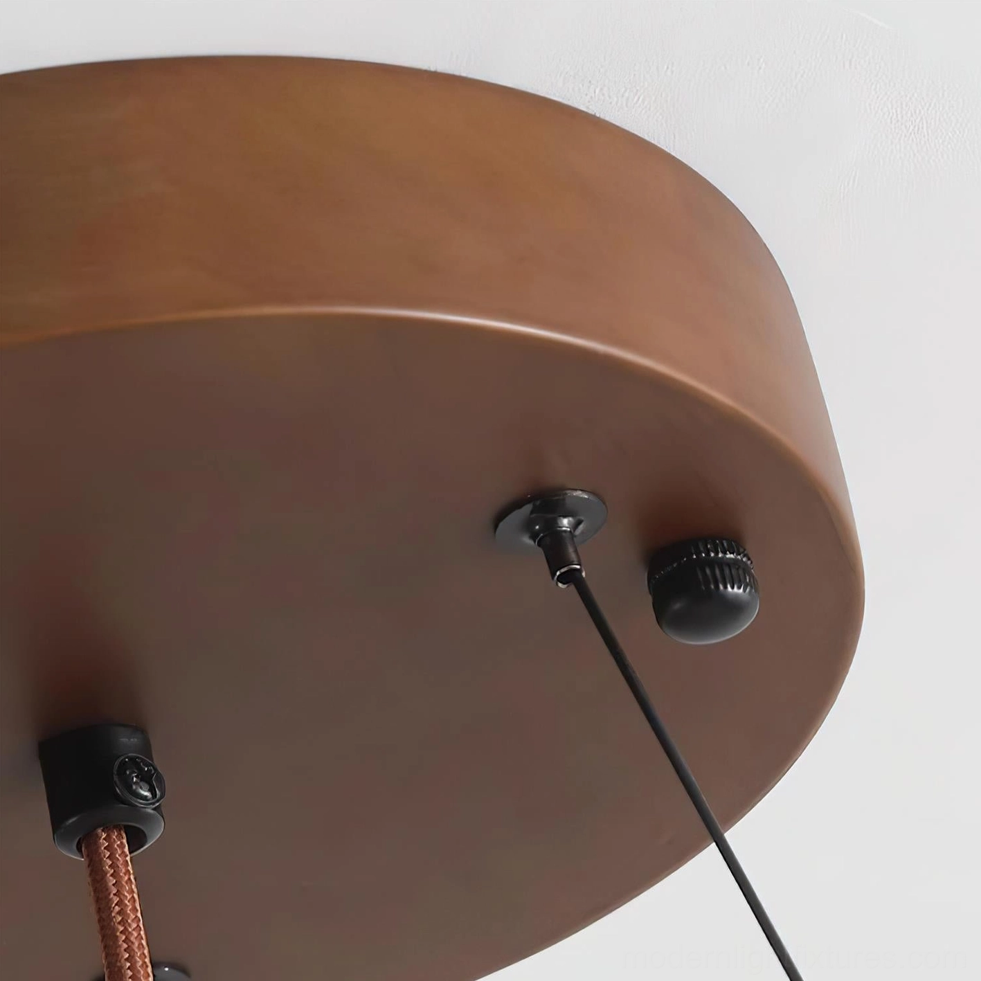 Travertine pendant light in wabi-sabi style interior with warm neutral color palette