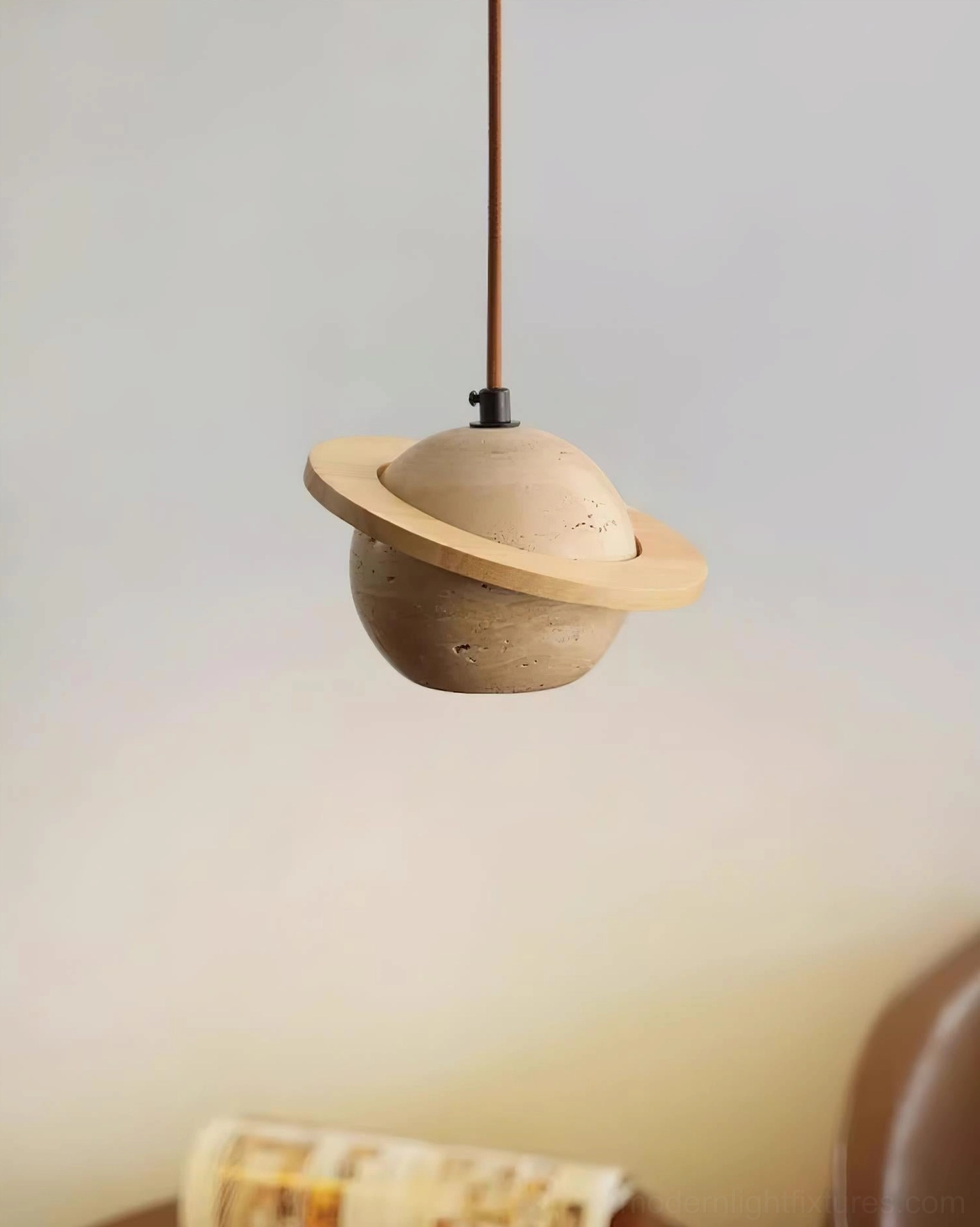 High-quality travertine sphere pendant light fixture with warm walnut wood ring, premium natural stone lighting