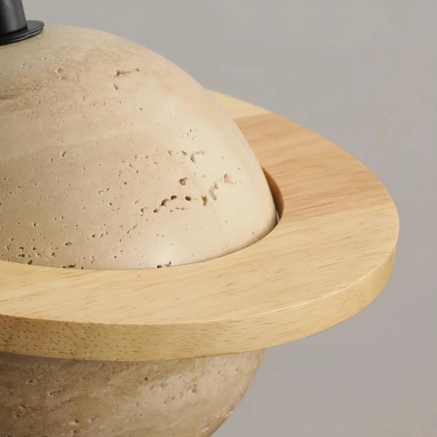 Multiple travertine sphere pendant lights creating gallery-like artistic progression, sculptural lighting for luxury homes