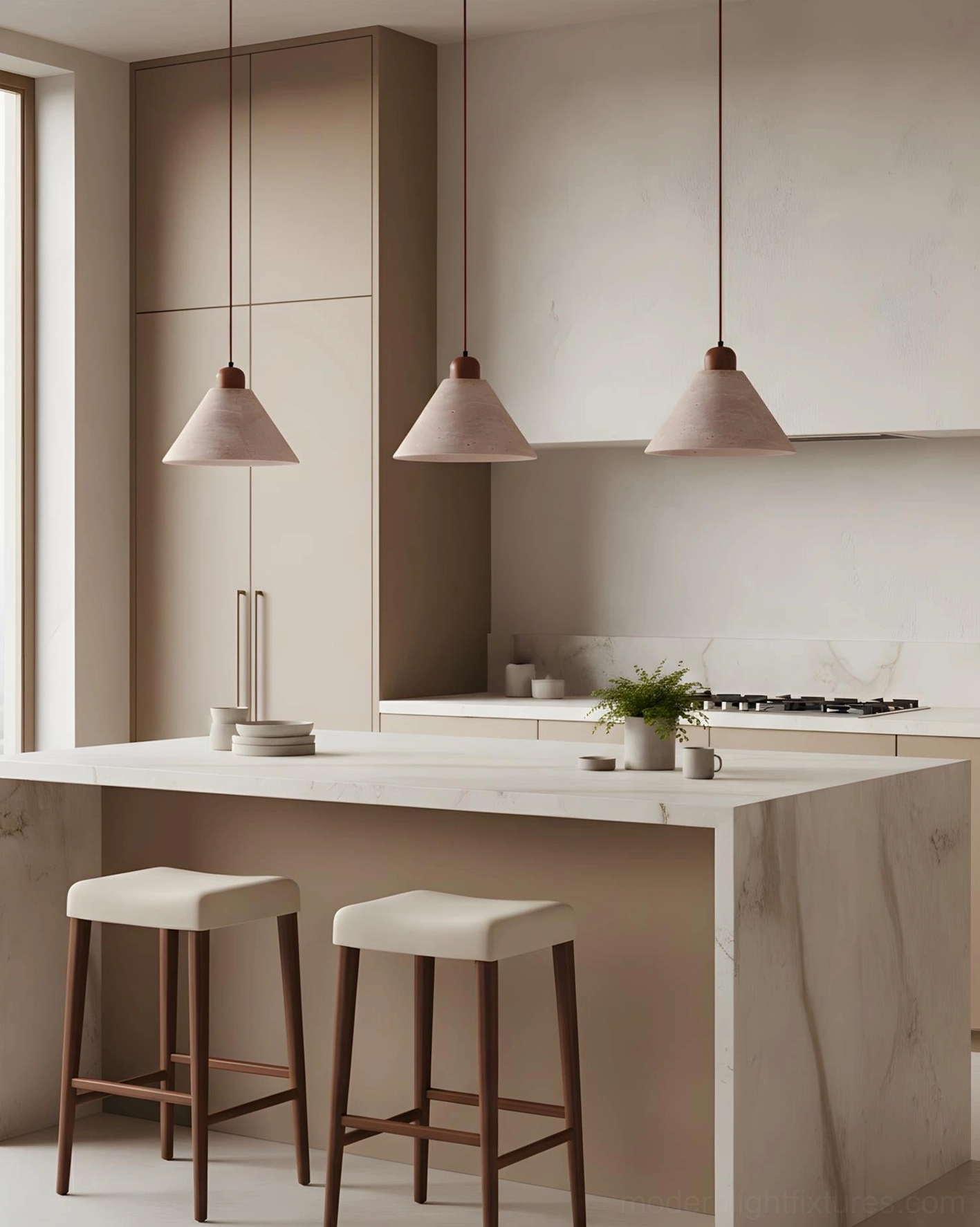 Three-pack travertine pendant lights with matching beige cone shades above warm-toned modern kitchen island and countertop