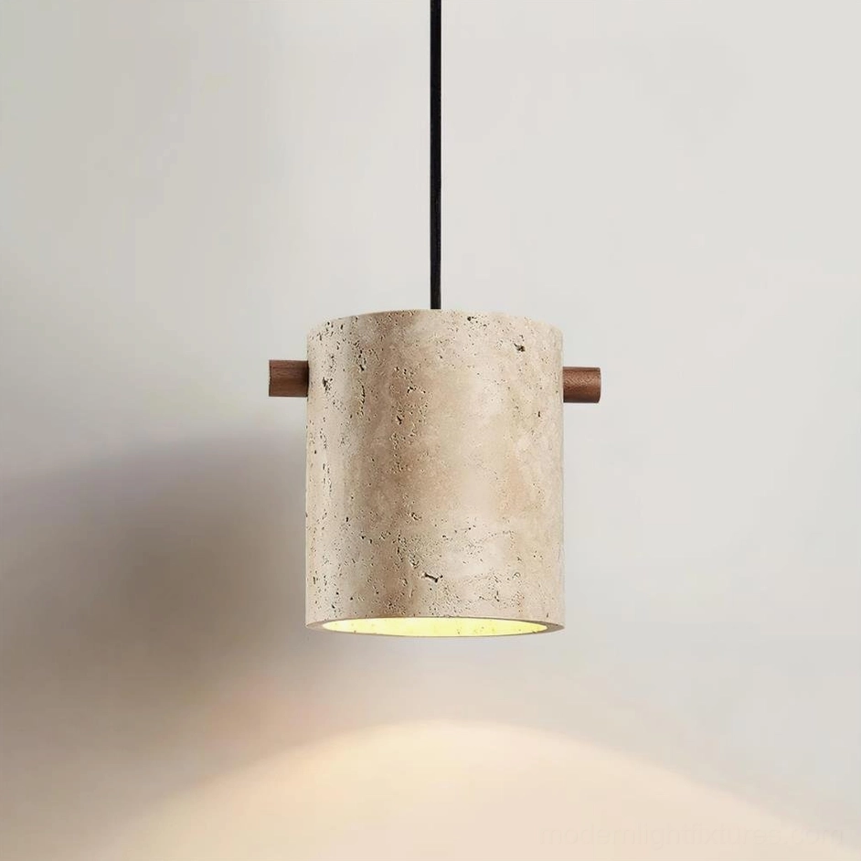 Single travertine pendant light fixture, angled perspective showing natural stone texture and warm interior lighting