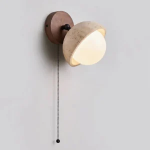 Modern travertine pull-chain wall sconce side profile, displaying stone texture and minimalist wood base design