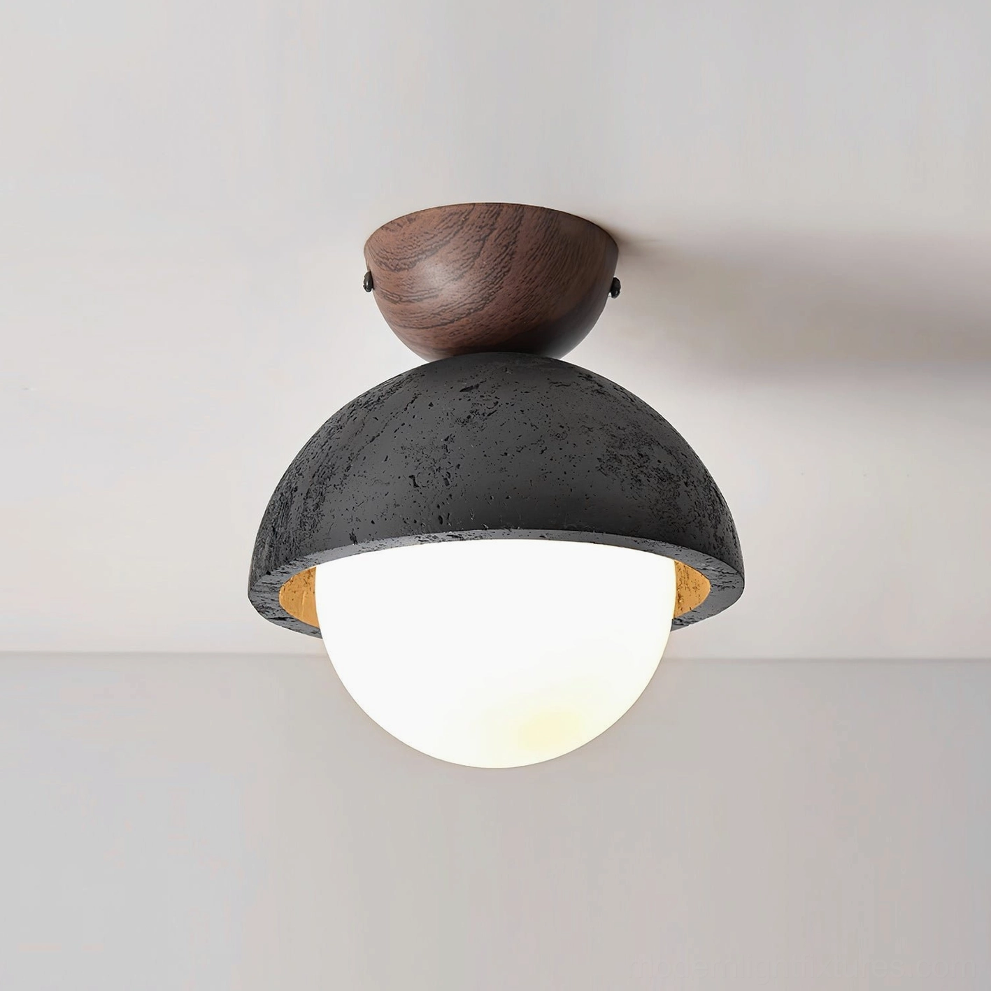 Travertine dome ceiling fixture with scalloped edge natural stone detail