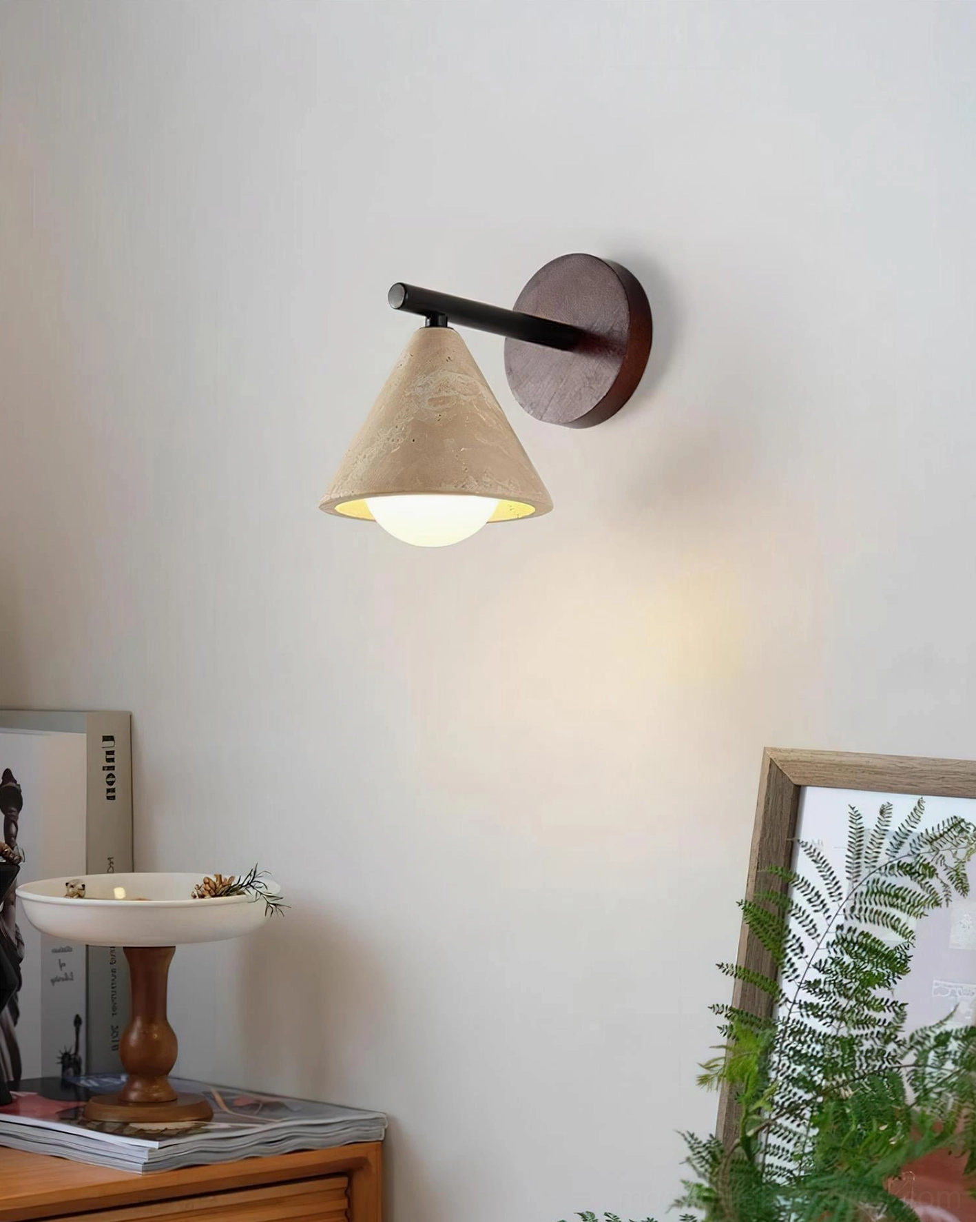 Travertine wall sconce single installation creating focal point accent lighting