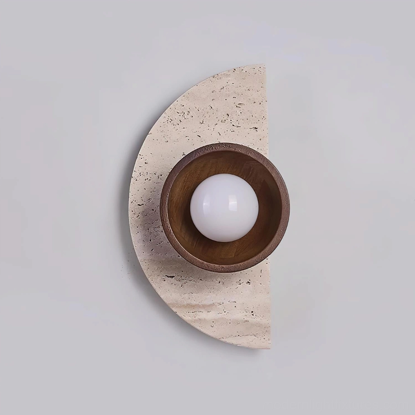 Contemporary travertine wall lamp with wood housing mounted as bedroom accent lighting near natural elements