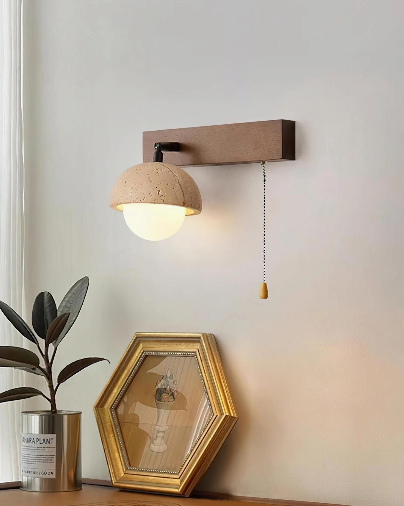 Scandinavian wall sconce installed in rustic home corner with plants and minimal décor