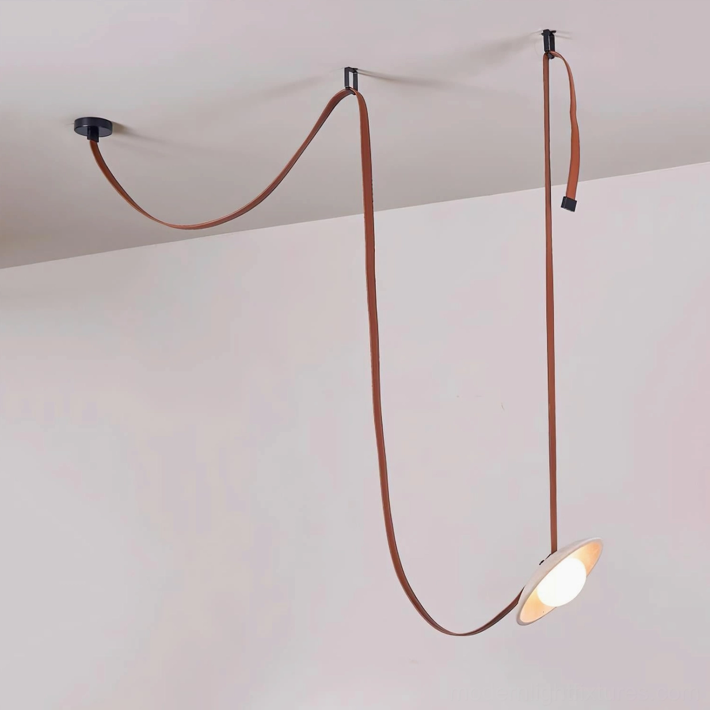 Single head travertine chandelier with red leather and beige stone, studio view showing pendant proportion