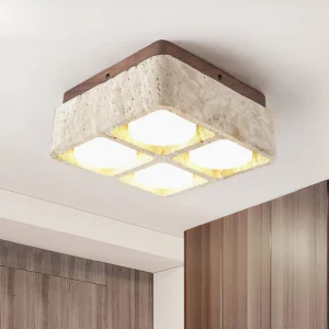 Modern travertine ceiling light fixture installed in contemporary home interior, warm illumination showcasing minimalist design aesthetic