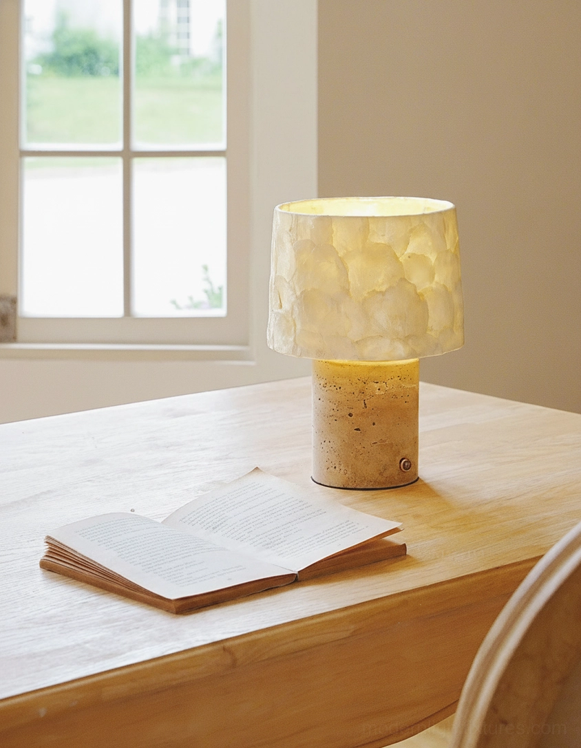 Compact bedside table lamp on wooden desk with natural window light illumination