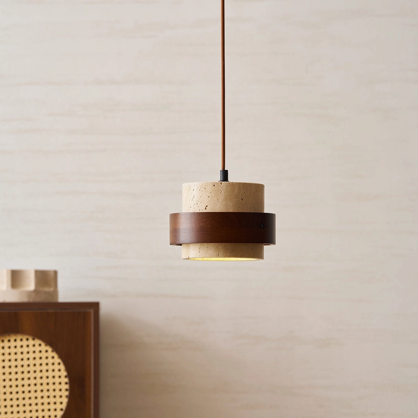 Natural travertine stone pendant light close-up showing unique mineral veining and porous stone surface characteristics